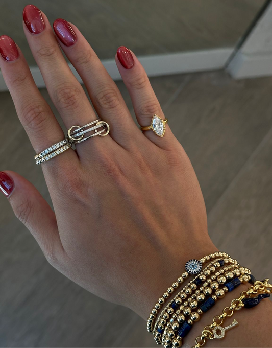 Stackable ring with 14 k gold accents